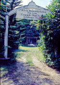 Wilcommen, No. 0157 Santa Lourdes Grotto from Entrance Sign